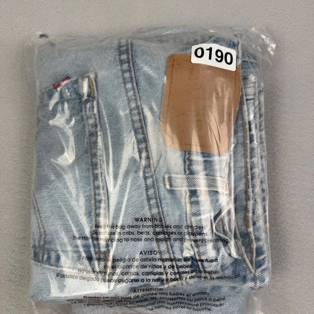 Thrashed Vintage Levis 550 Relaxed Fit Jeans Light Wash Made in USA W34 L36 90s